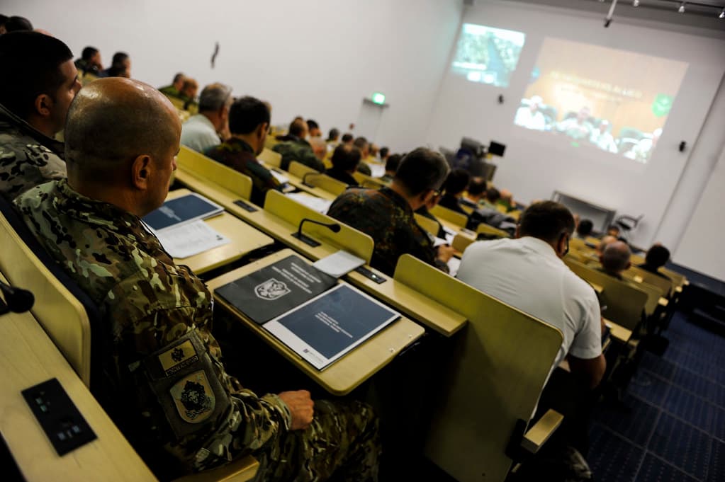 Professionals participating in a training conference